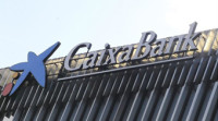 CaixaBank ganó 620 millones en 2014