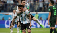 Messi y Rojo resucitan a Argentina