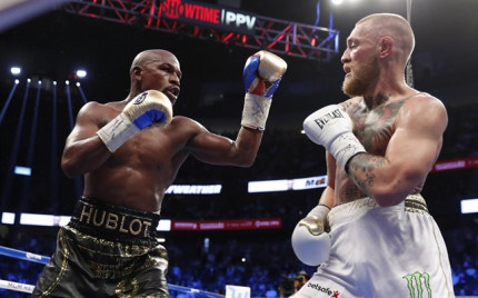 Mayweather pone el 50-0 ante un valiente McGregor