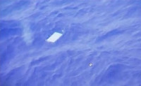 Un barco chino, en la nueva zona de búsqueda del avión desaparecido